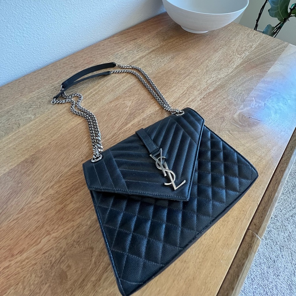 Selling mother’s SL purse lightly used.